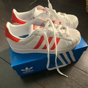 Brand NEW. Never worn. Adidas x Hattie Stewart Superstars.